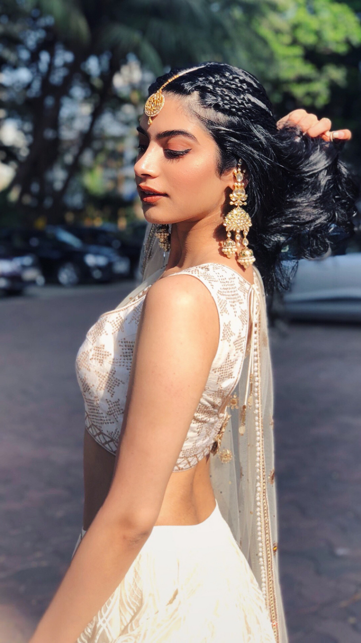 Photo of Light green lehenga with unique blouse for sister of the bride