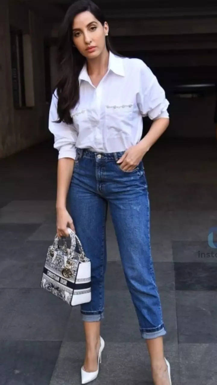 Nora Fatehi Casually Ups The Style Quotient In Her Stylish White Top And  Blue Jeans