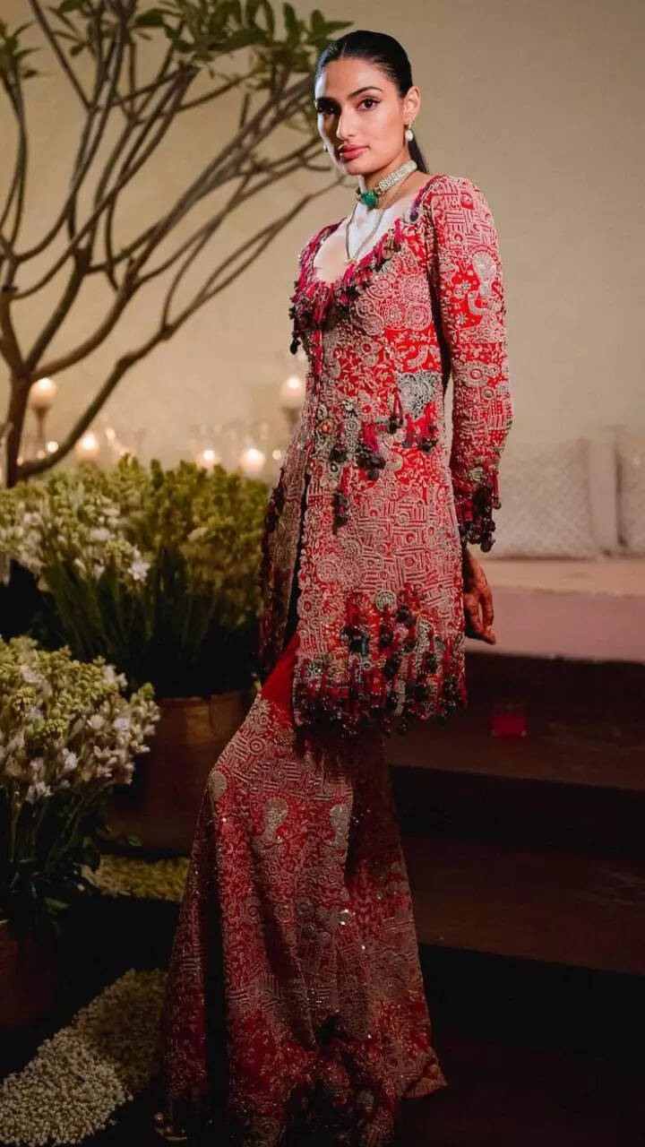 Fuchsia pink anarkali or sharara with slit: Which ethnic look did bride Athiya style better?| Zoom TV