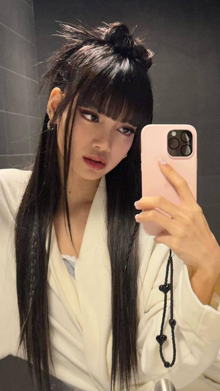 KPop Star Lisa of Blackpink Teased Solo Debut With UltraLong Braided  Pigtails  Photo  Allure