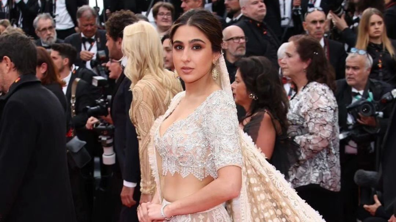 Cannes 2023: Sara Ali Khan Is Giving Desi Bride In Embellished Lehenga, Veil Tucked In Hair For FIRST Red Carpet Moment (1)