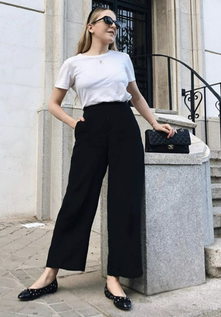 Work Outfit Idea Roomy Black Trousers a ShortSleeve Blouse and Bright  Heels  Glamour
