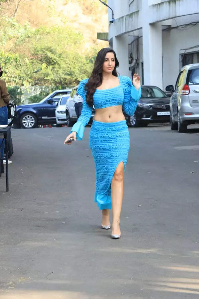 Nora Fatehi flaunts toned belly in electric blue crop top, turns up heat in new photos