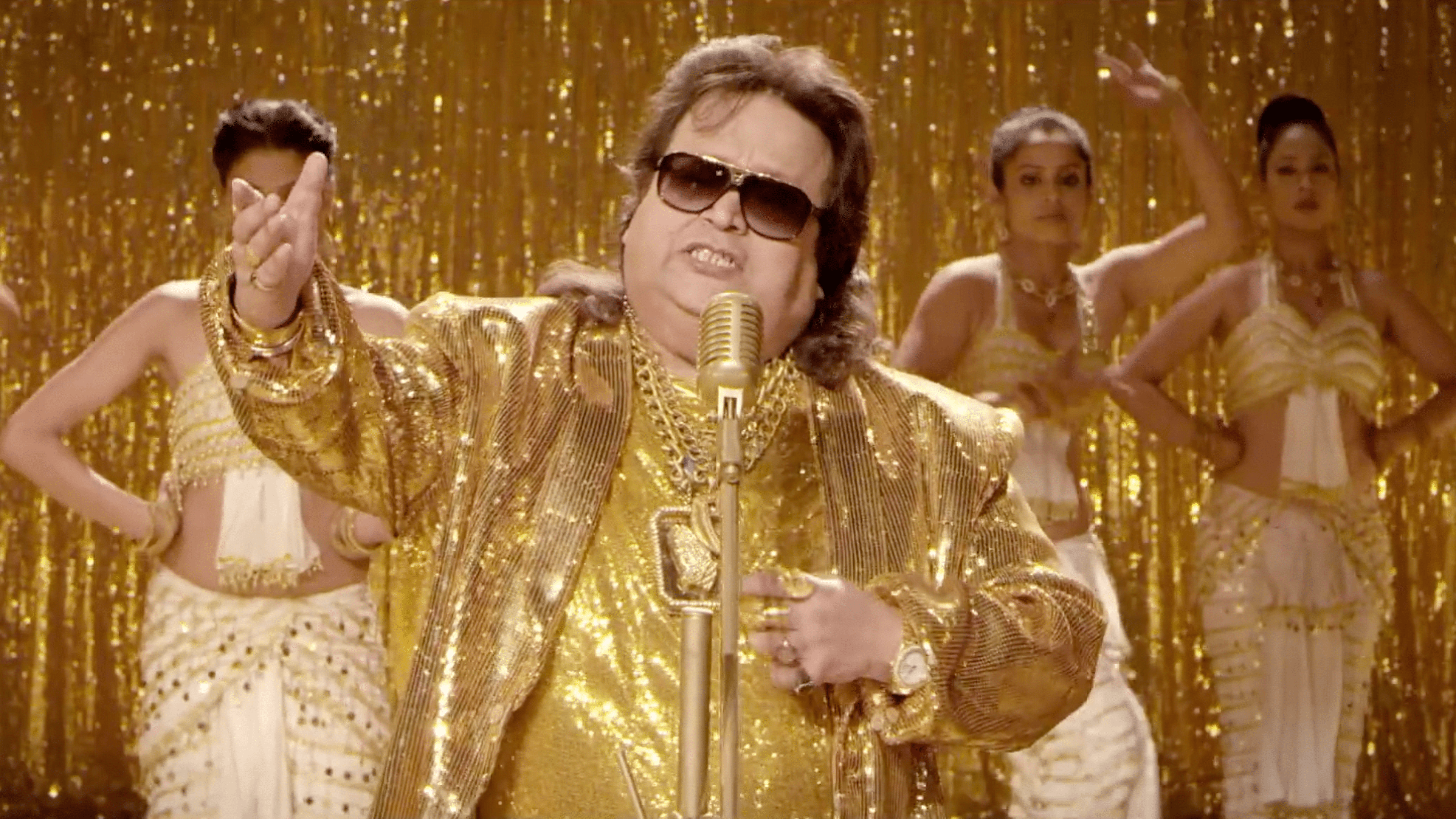 India's disco pioneer Bappi Lahiri no more: Walking back on the maestro's  footsteps in Mollywood | Bappi Lahiri wear so much gold