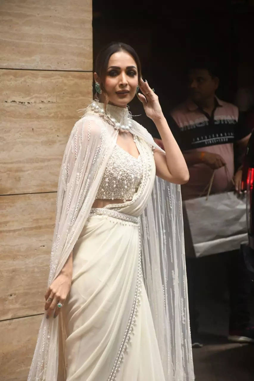 Malaika Arora Steps Out In Cape-Style White Saree in Mumbai's Heat And We  Are Not Complaining. See PICS