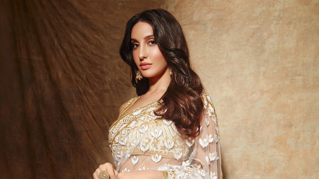 Nora Fatehi gets swamped by fans at airport; netizens say, 'Don't crowd ...