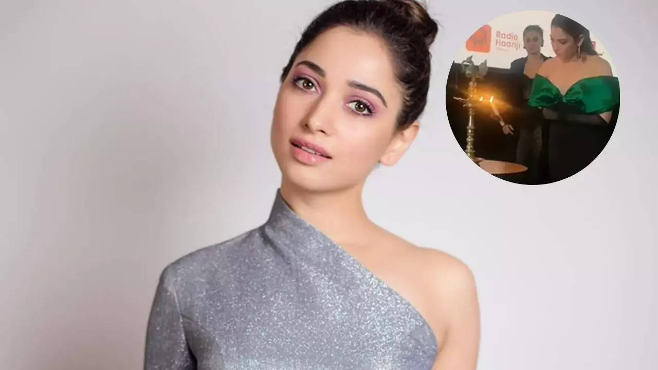 Tamannaah: Tamannaah Bhatia Takes Her Heels Off Before Lighting The ...