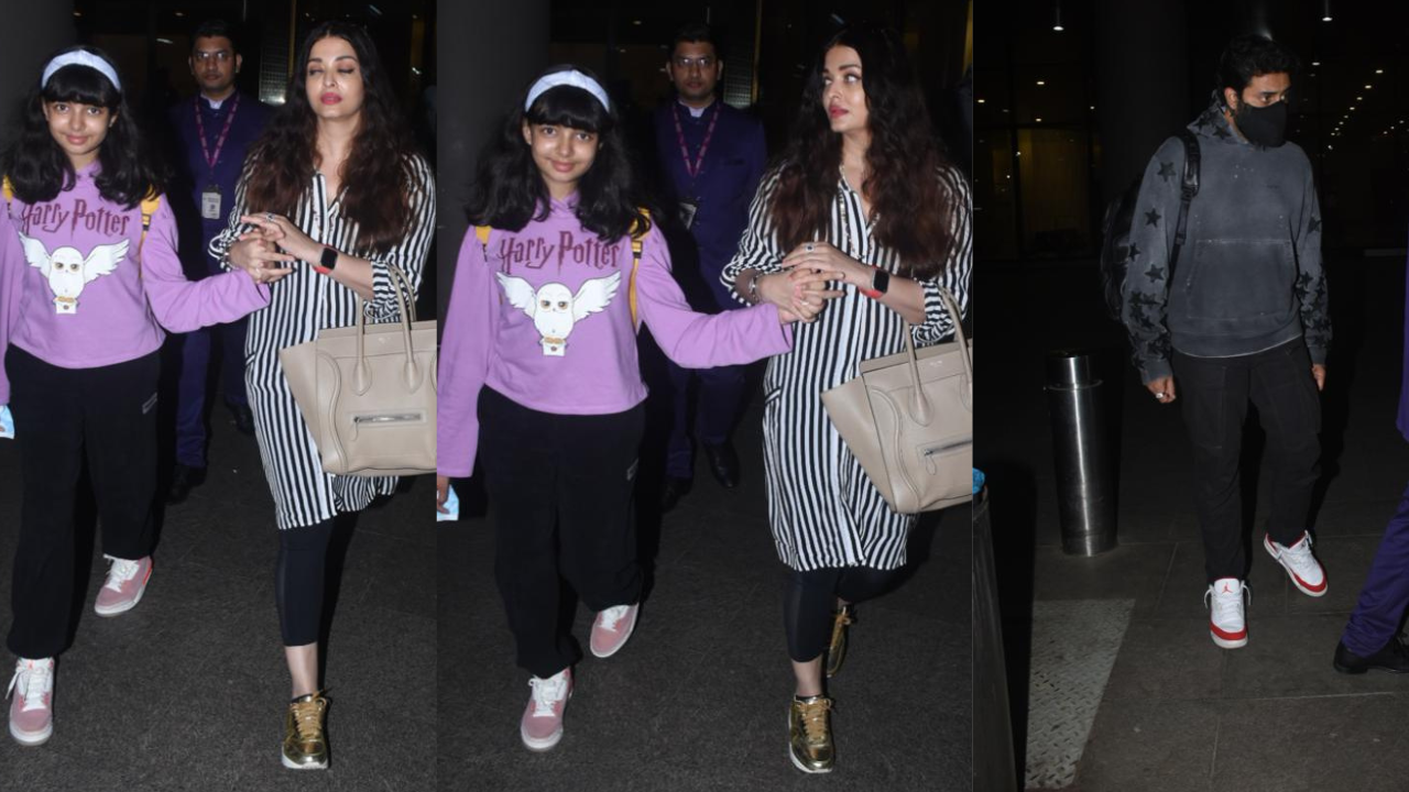 Aishwarya Rai holds Aaradhya's hand as she makes her way out of the airport  with husband Abhishek Bachchan – See pics